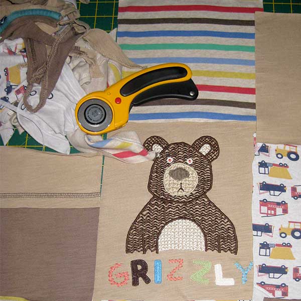 MayCrafts baby clothes quilt